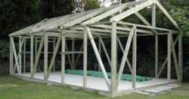 Frame with roof trusses